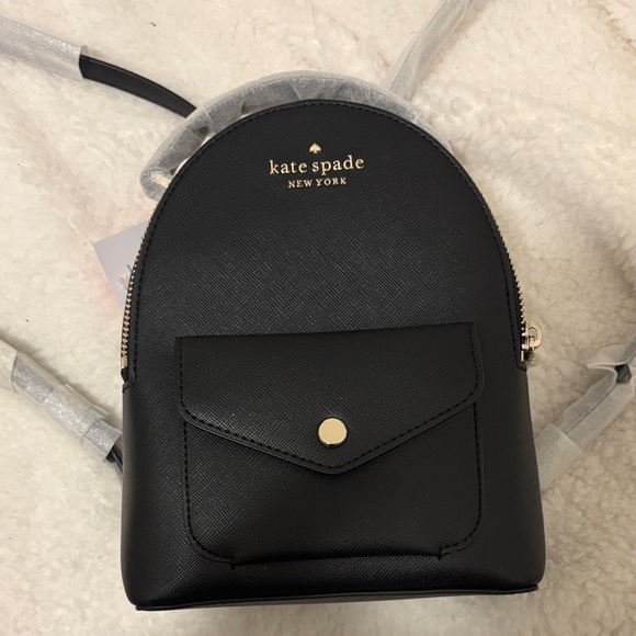 kate spade Handbags - Kate Spade Black Backpack with Gold Accents